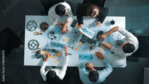 Wallpaper Mural Top view of engineer show and talk about turbine engine design. Time lapse of designer and technician working and planning about engine construction. Project manager handed document. Alimentation. Torontodigital.ca