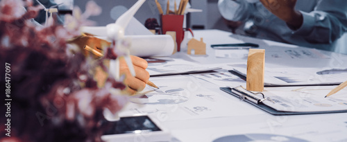 Foto Engaging teamwork in a modern workspace focused on sustainability and innovative design solutions