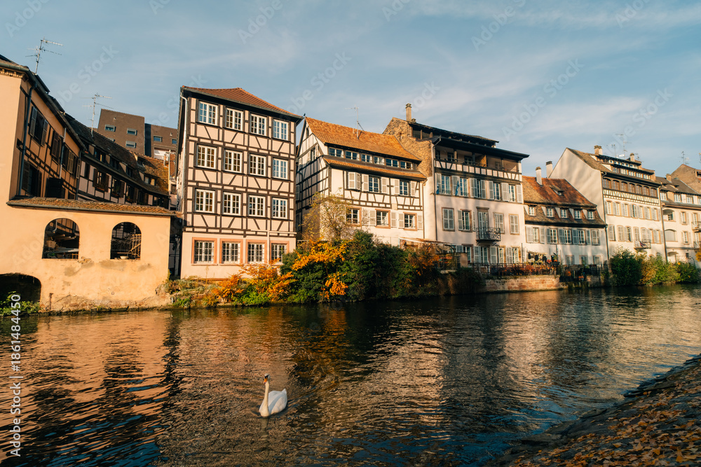 Obraz premium Strasbourg, France - September 5, 2025 Old town water canal of Strasbourg, Alsace, France. Traditional half timbered houses of Petite France