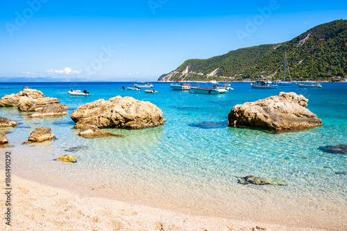 Wallpaper Mural Rocks and stones in crystal clear turquoise sea water of Agios Nikitas beach, Lefkada island, Greece Torontodigital.ca