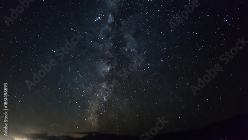 The Milky Way galaxy glowing brightly across a dark night sky