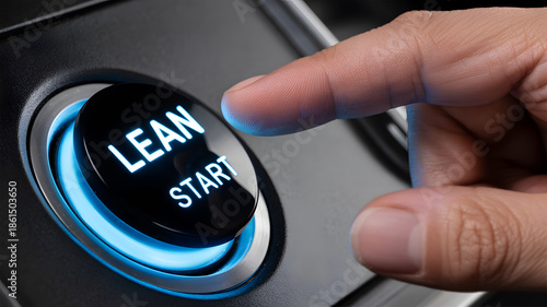 Finger pressing glowing blue lean start button for business launch