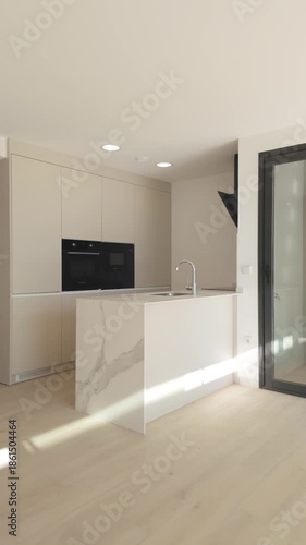 Vertical shot of modern kitchen interior with natural light