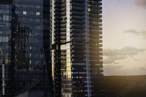 Tall, residential skyscrapers and sunset, aerial view.