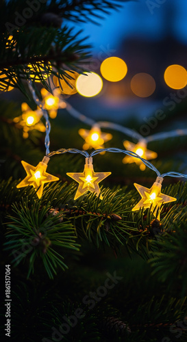 Golden Christmas tree with lights and stars decorations
