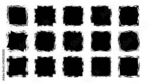 Collection of black squares with rough edges
