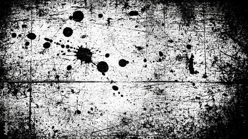 Black and white grunge texture with splatters and scratches on a background