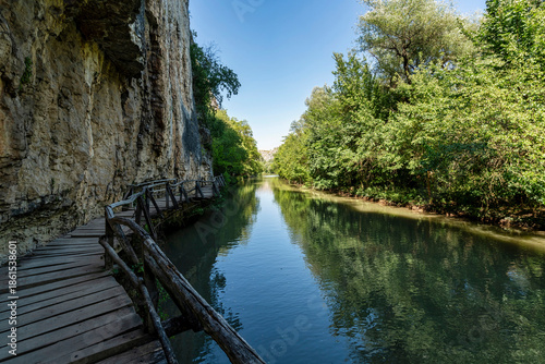 Wooden Walkway Along Limestone Cliffs of Rusenski Lom River