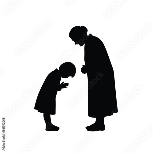 Silhouette of mother and child sharing a tender moment together