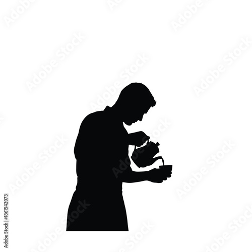 Silhouette of a person pouring tea into a cup