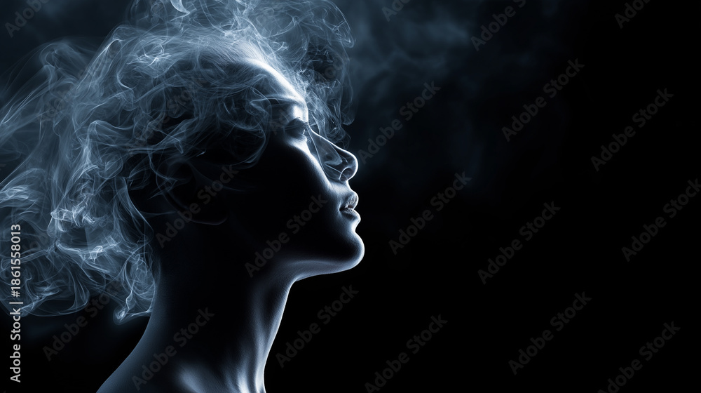 Obraz premium A human face partially obscured by flowing smoke creating a mysterious and abstract emotional concept. 