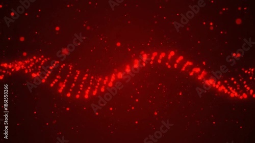 Abstract red particles flow across dark background
