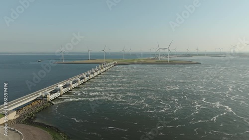 Bridge and flood barrier with wind engines on the coast of the Netherlands