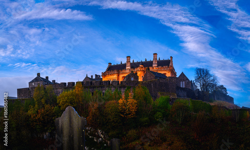 Bild auf Leinwand Stirling Castle perched over the cliff on an autumn morning after rain in Scotland, United Kingdom
