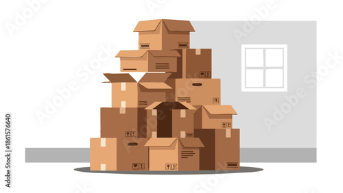 Stacked recycled cardboard boxes in a garage with window  