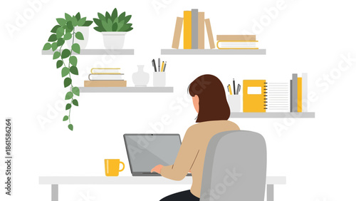 Woman working from home office with laptop surrounded by books and plants in modern minimalist setup