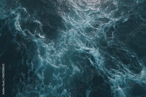 Sparkling Turquoise Ocean Surface Water with Dynamic Wave Patterns Abstract Seascape Texture Reflecting Sunlight in Marine Environment Detailed Aerial View