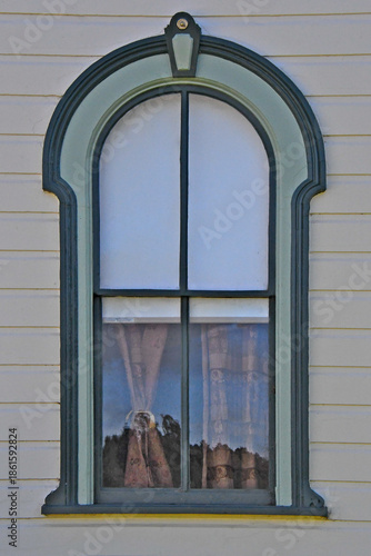 Photography Rounded arch window with faux keystone to provide visual emphasis and add a hall