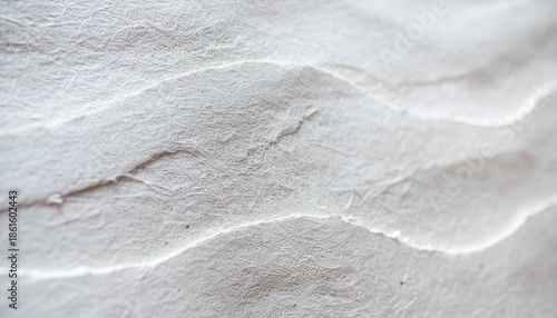 Handmade paper texture with organic uneven surface.