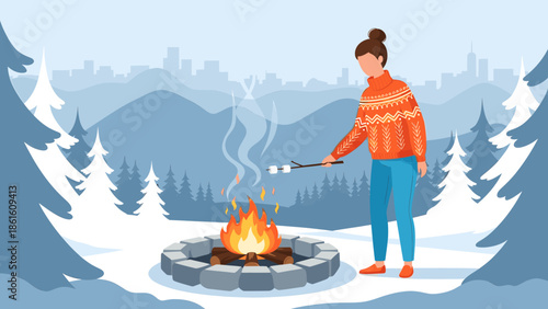 Woman roasting marshmallow over campfire in snowy mountains