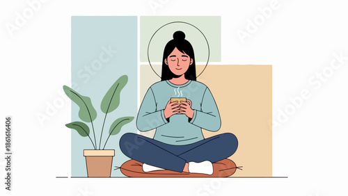 Young woman sitting cross-legged on wooden surface holding steaming cup of tea or coffee