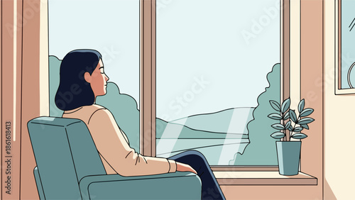 Woman sitting in teal armchair near large window with outdoor view
