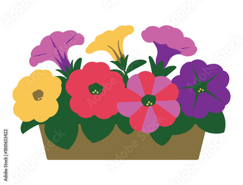 A colorful planter overflowing with blooming petunias in various vibrant hues.