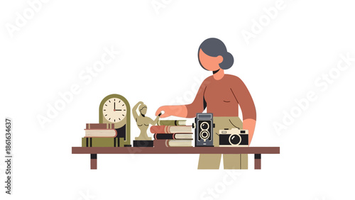 Vintage collectibles enthusiast with retro cameras and antique books