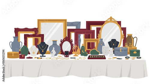 Elegant display of antique frames and vintage jewelry on table