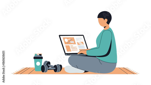 Young person working on laptop at home with dumbbells and protein shake