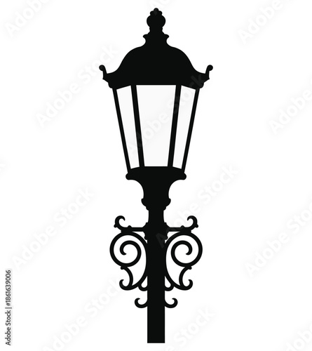 Vintage single street lamp with ornate decorative iron work silhouette art