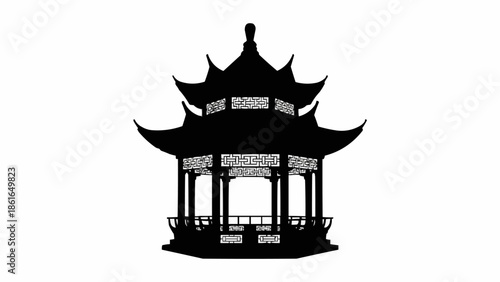 Silhouette of a traditional Asian pagoda building with multiple tiers.