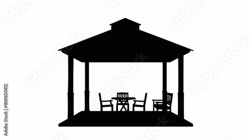 Silhouette of a wooden gazebo with table and chairs.