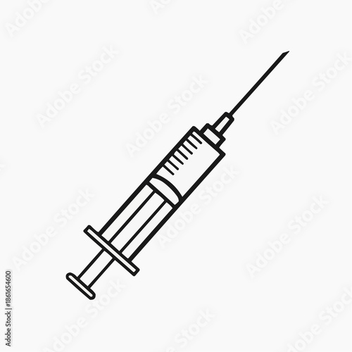 A medical syringe with a needle on a plain background