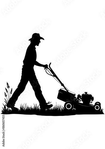 Silhouette of a man using a lawn mower to cut grass
