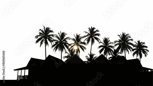Silhouette of tropical bungalows and palm trees against bright sky.