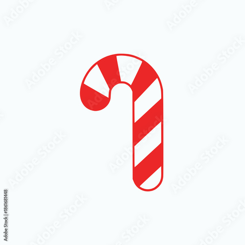 Vibrant red and white candy cane on white background