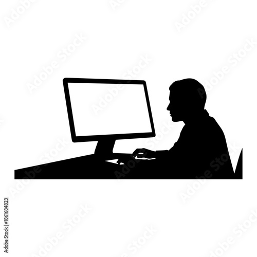 Silhouette of a person sitting at a desk using a computer monitor in a workspace setting.