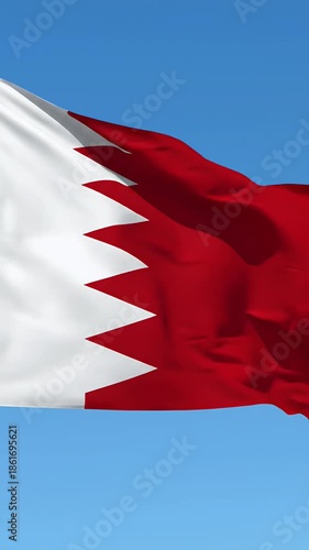 Bahrain Flag Waving Proudly Against A Clear Blue Sky