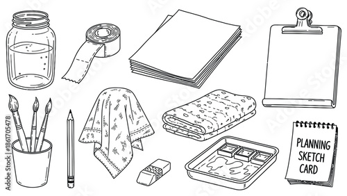 Assorted art supplies and stationery items neatly arranged.