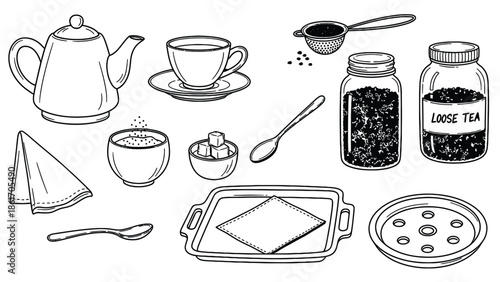 Assorted tea items including teapot, tea cup, tea leaves, and tea accessories.
