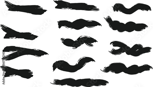 set of black silhouettes of birds