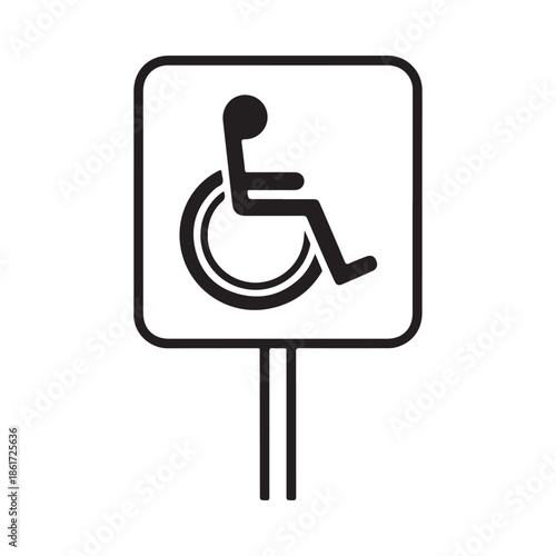 A black and white accessibility sign depicting a person in a wheelchair is displayed