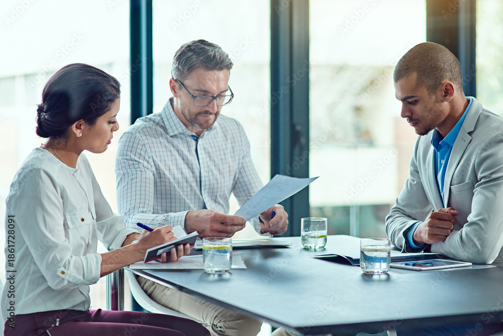 Obraz premium Documents, strategy and team with business people in office for property developer, funding and planning. Real estate proposal, partnership and review with employees in agency for report paperwork