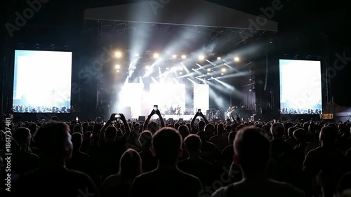 Wallpaper Mural A concert crowd gathers at the stage with energetic lights shining on performers Torontodigital.ca