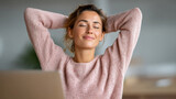 Relaxed person enjoying a work break at desk for enhanced wellness and productivity