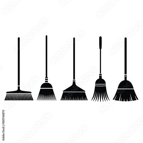 A collection of five black silhouette brooms arranged in a row