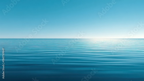 Serene Azure Seascape with Sunlit Horizon and Gentle Ripples Reflecting the Clear Blue Sky in Calm Water Environment