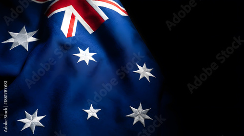 Australia day shows a portion of the australian flag with the union jack and stars on a blue field against a dark background
