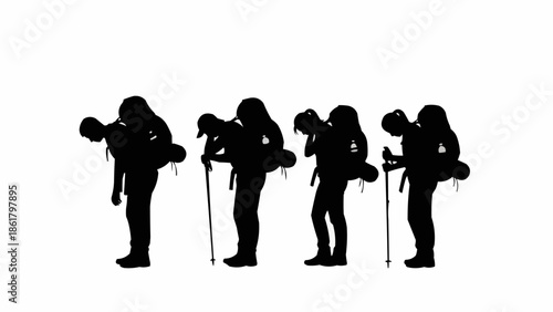 Silhouettes of hikers with backpacks and trekking poles.